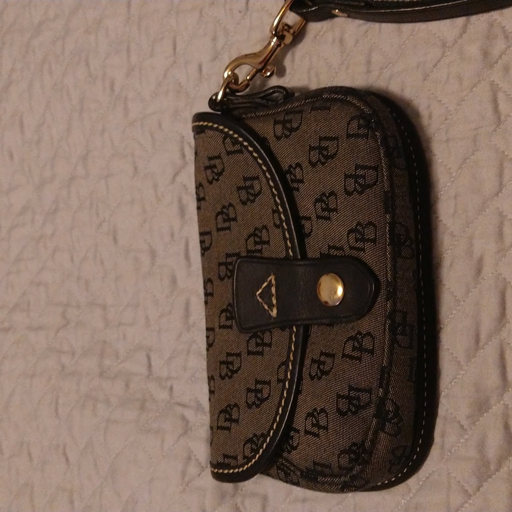 Vintage Dooney & Bourke Signature Black Wristlet. Tan inside.